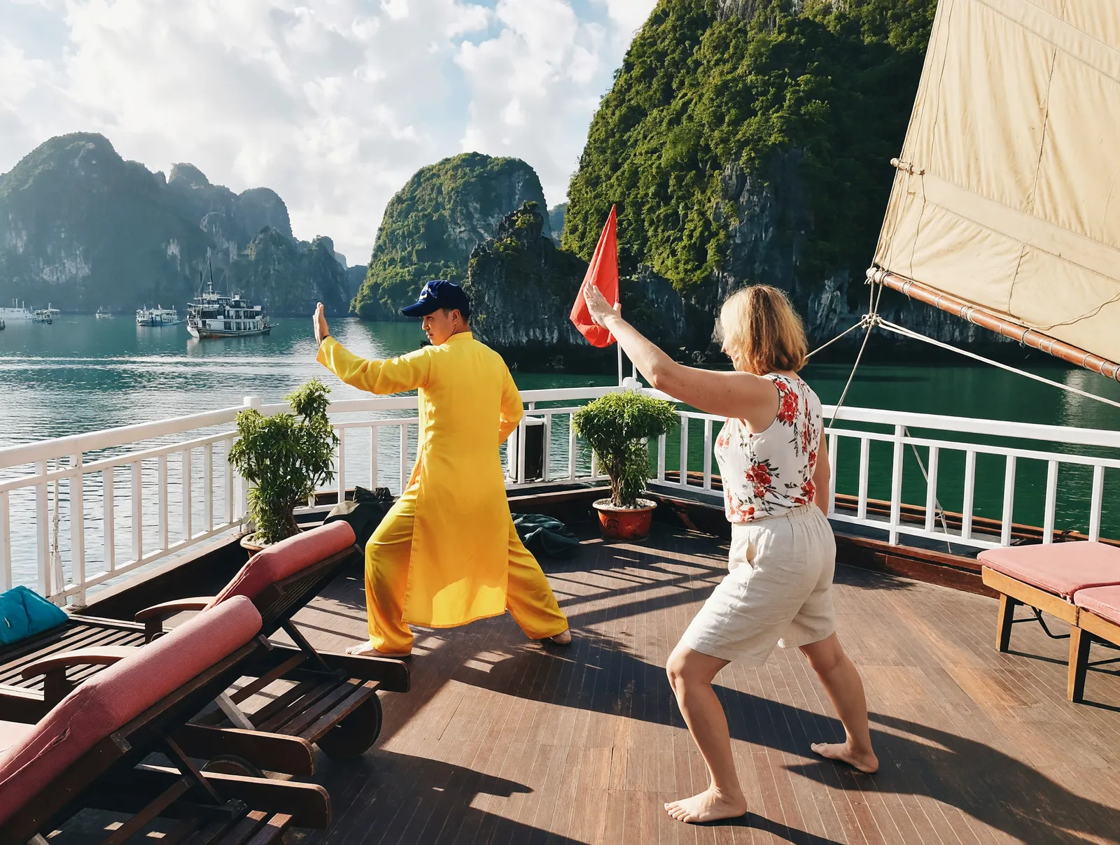 Sunrise tai chi session on the deck of a Ha Long Bay cruise